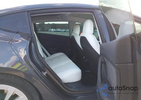 2021 Tesla Model 3 Standard Range Plus Rear-Wheel Drive from USA, damaged, VIN 5YJ3E1EA9MF059271